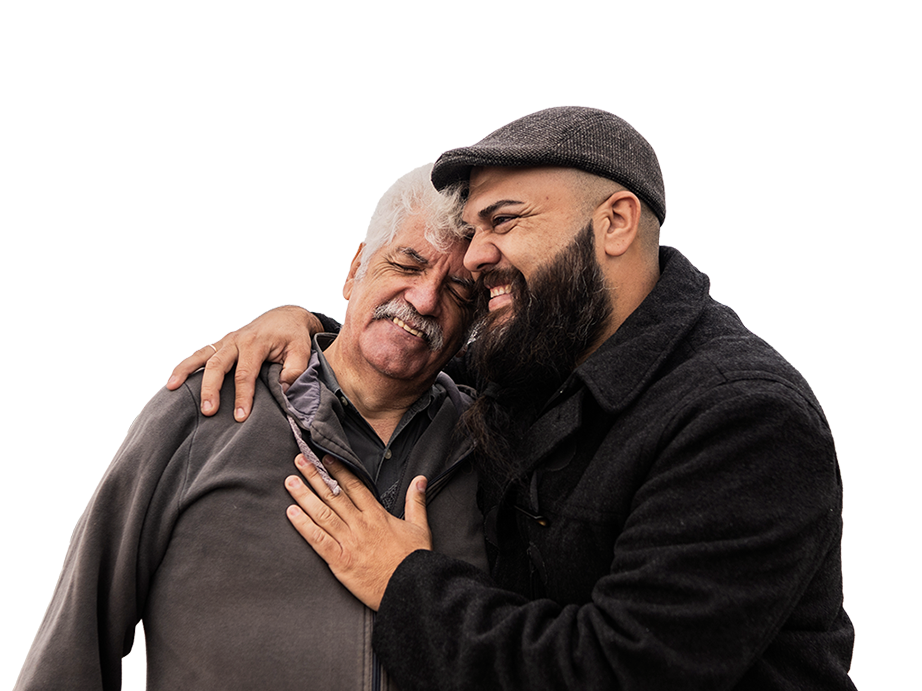 Son hugging father after choosing life insurance